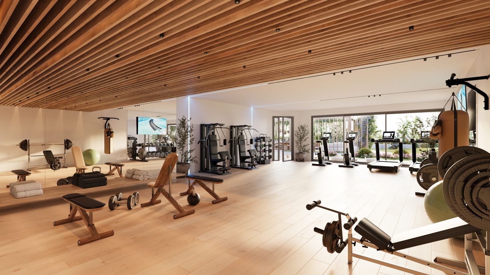 Moderne fitnessruimte in Altos del Chaparral met diverse fitnessapparatuur en houten plafond.